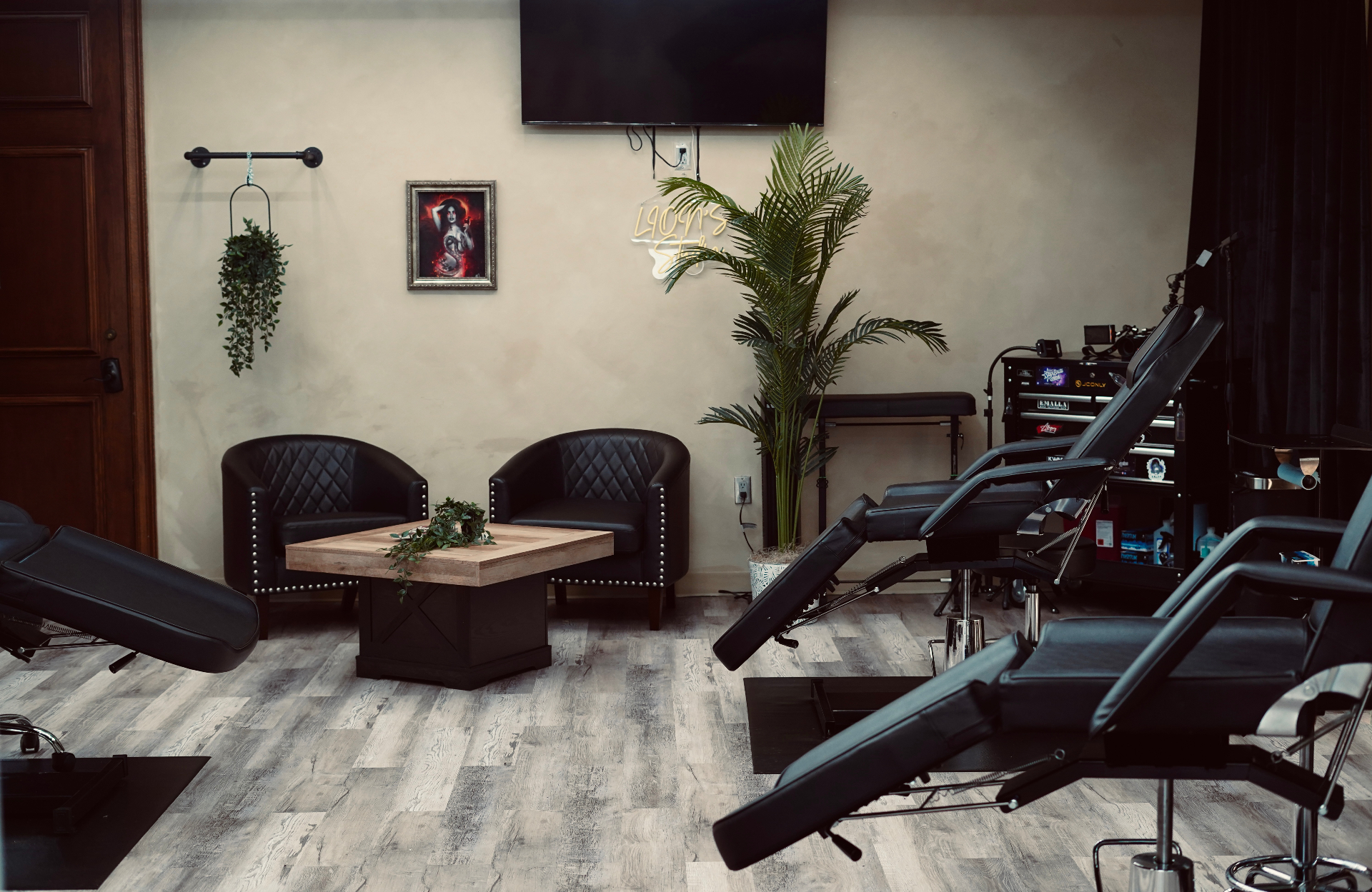 LION'S STUDIO — lounge and neon sign